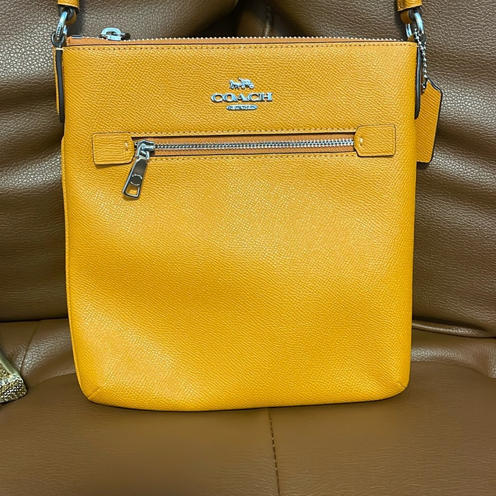 Brand new Orange Coach crossbody